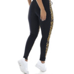 Calça legging em animal print amarelo costas
